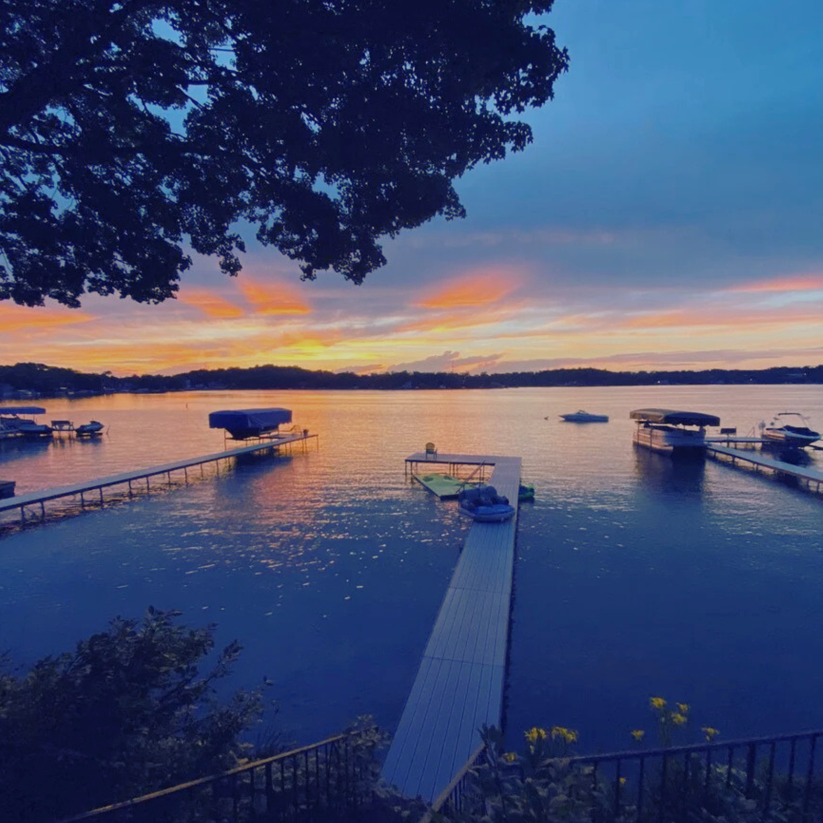 Sunset over Geneva Lake from a vacation rental pier